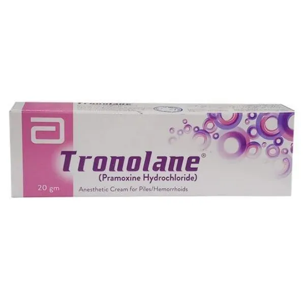: A tube of Tronolane cream 1%, with a label indicating its uses, side effects, precautions, and price.