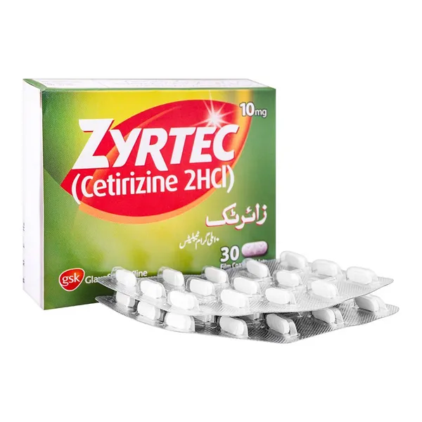 A blister pack of Zyrtec tablets, with the brand name and dosage clearly visible.
