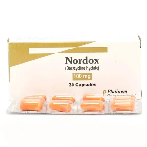 Nordox Capsule 100mg displayed on a white surface.