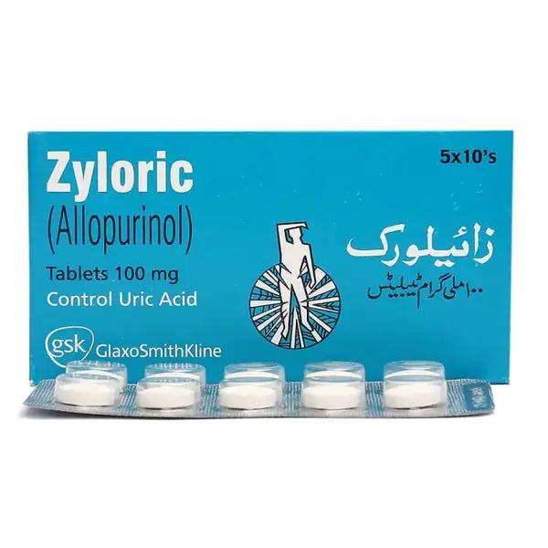 A blister pack of Zyloric Tablets 100 mg with the medication displayed alongside scattered tablets, representing its use for treating gout and elevated uric acid levels.