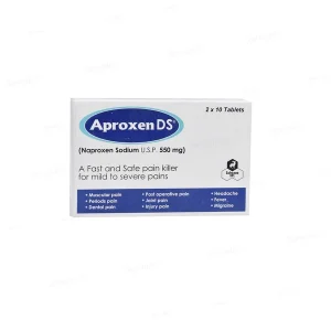 Aproxen DS 550mg tablets with a glass of water and a pill cutter on a white surface.