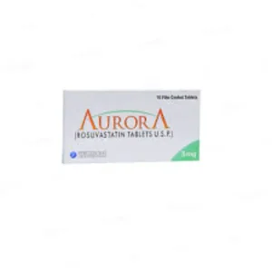 Aurora Tablet pack with scattered tablets, a glass of water, and a stethoscope on a white surface.