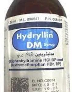 A bottle of Hydryllin DM syrup with a measuring cup, surrounded by scattered tablets and a cough expectorant.