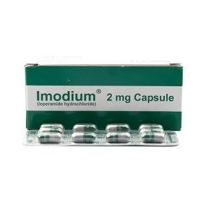 Imodium Capsule - A single green and white capsule in protective packaging, used to relieve diarrhea symptoms.
