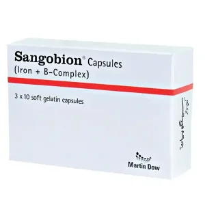 A close-up of Sangobion tablets, a type of iron supplement, on a white surface.